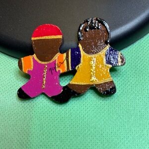 Wooden Cutout of two figures Pin